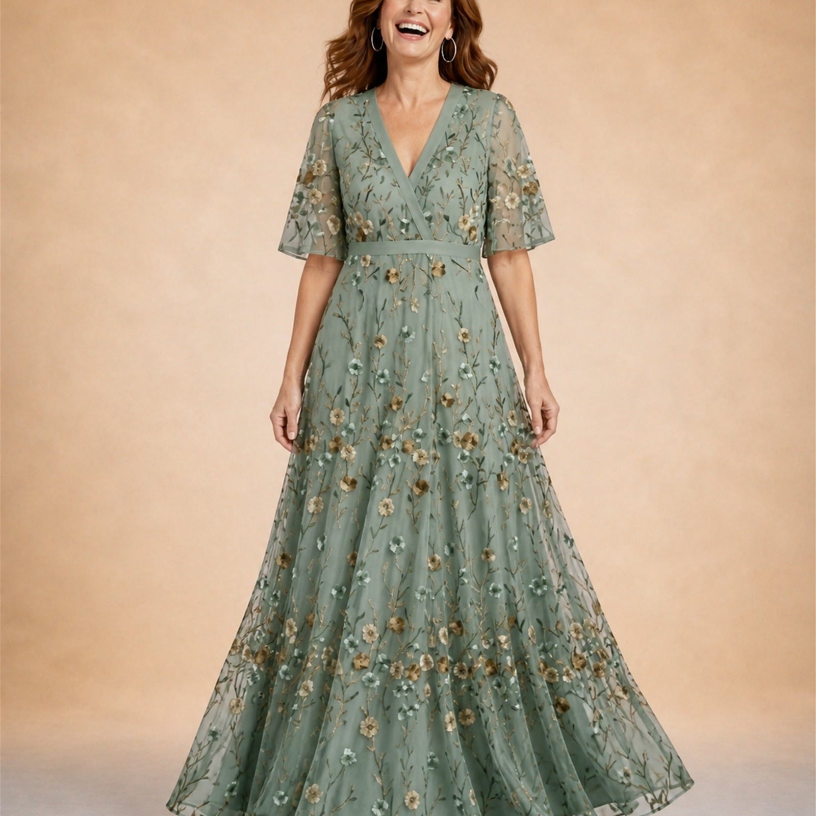 Ana-Roxana în rochie maxi verde salvie cu broderie florală, vedere frontală în studio