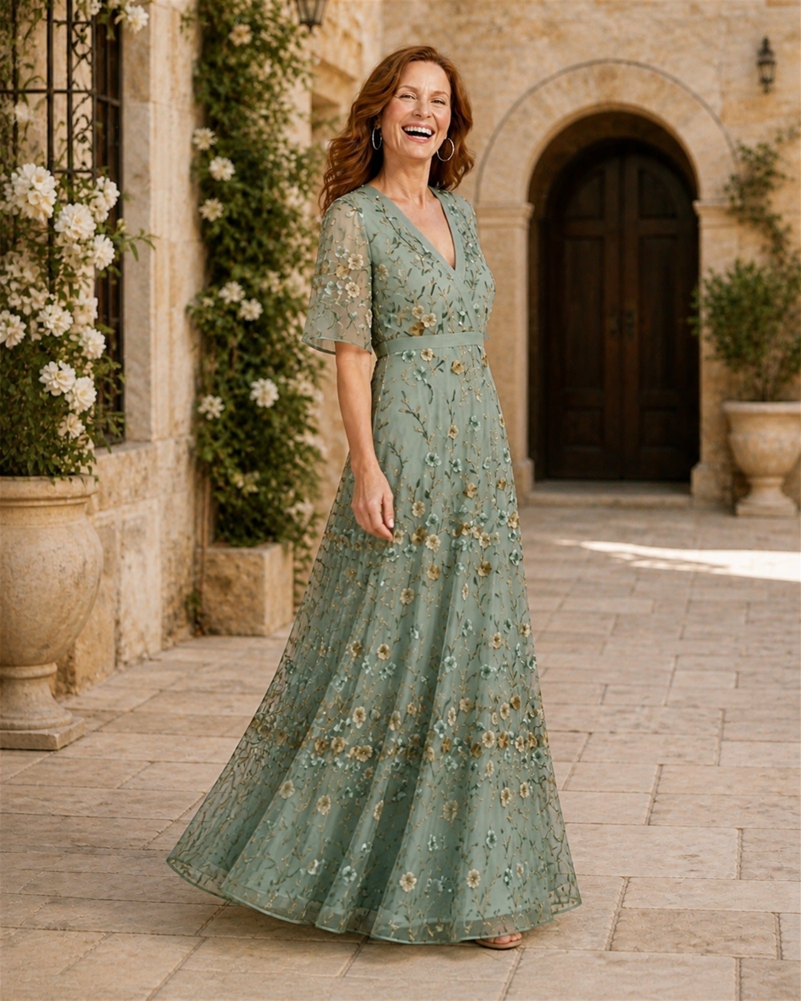 Ana-Roxana în rochie maxi verde salvie cu broderie florală, vedere laterală în exterior