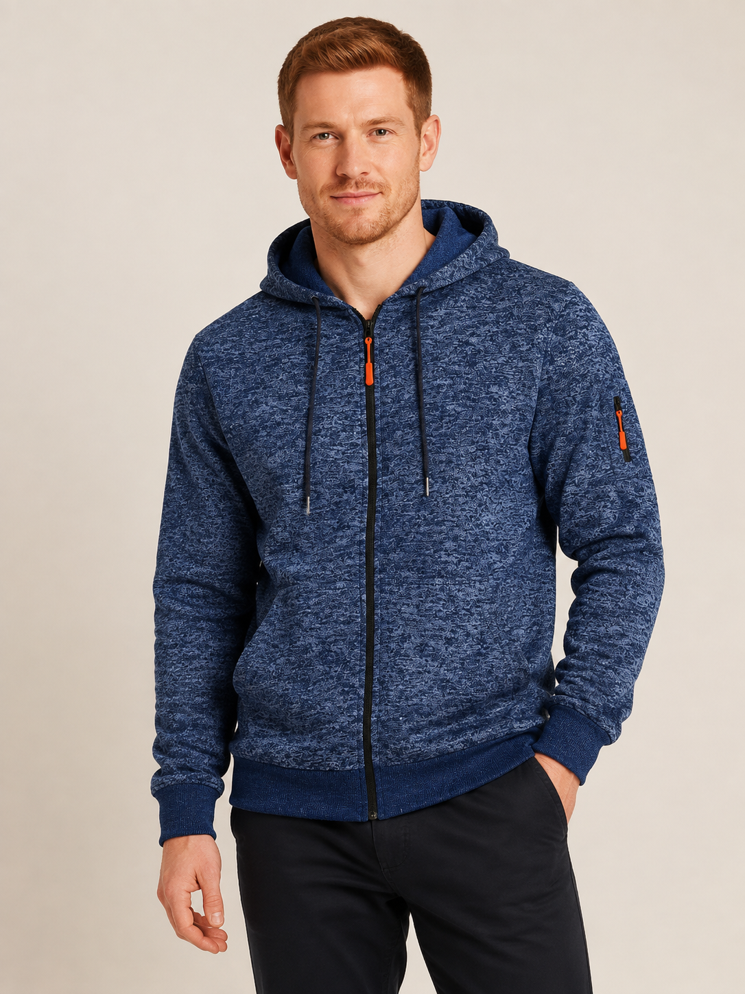 Men's heather navy-blue fleece zip hoodie, worn by model in warm beige studio