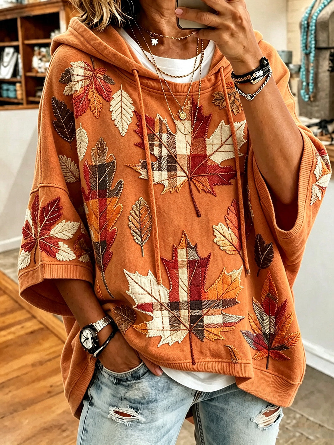 Herbst-Sweatshirt mit Blätter- und Patchworkmotiv – Kürbisorange