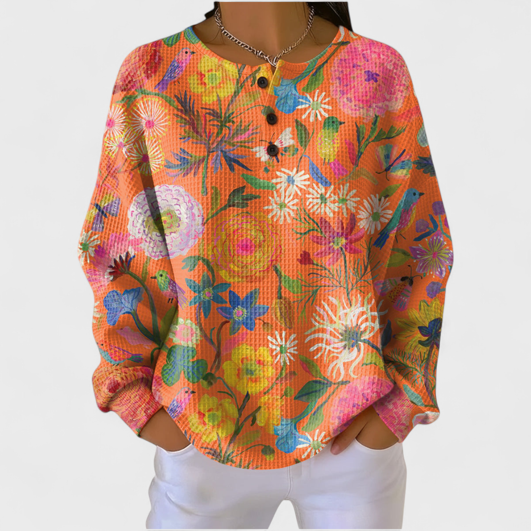 Faustine | Oranger Pullover mit Blumenmuster – Bild 1